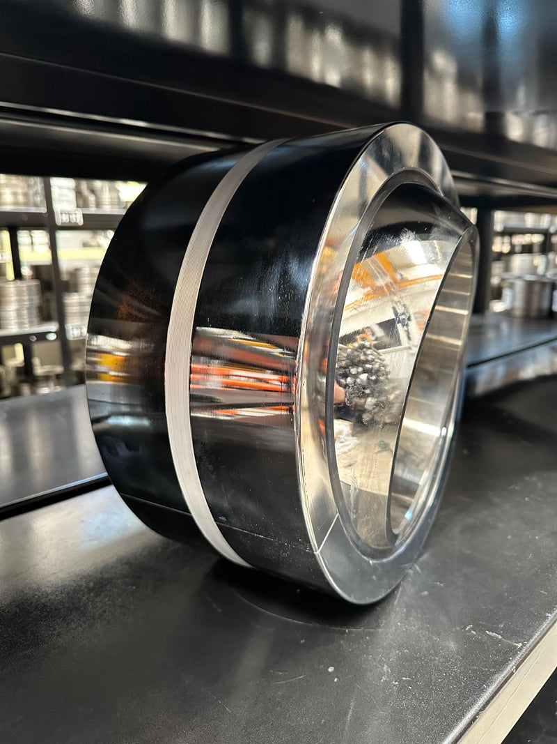 Brand new aftermarket hydraulic cylinder bearing for heavy mining equipment.