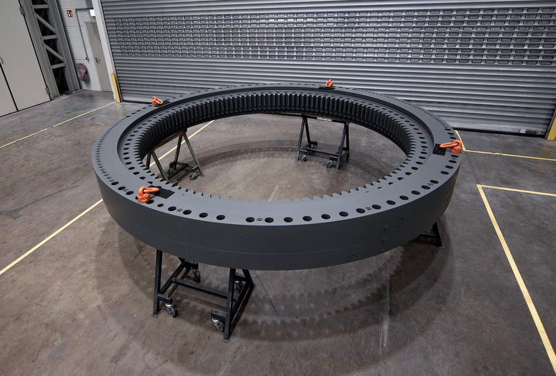 Brand new aftermarket slewing bearing for a Liebherr excavator.